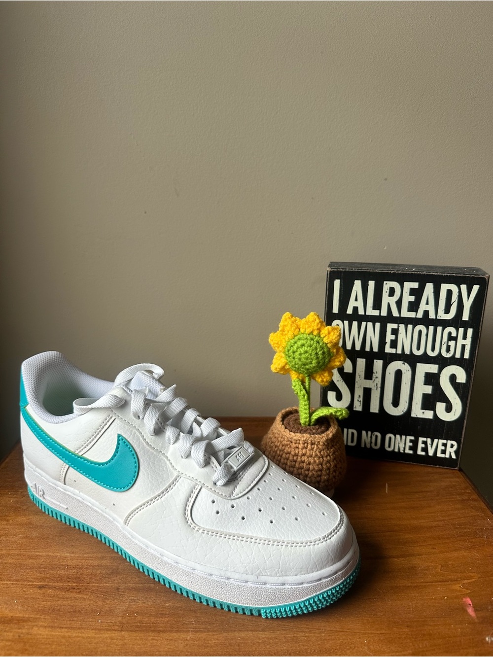 Nike White Sneakers with Teal Swoosh and Teal Outsole